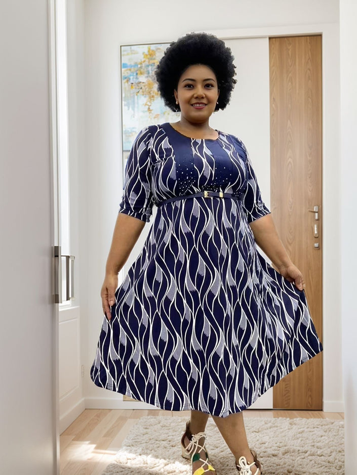 Plus size midi dress in dark navy with white wave geometric pattern, belted waist