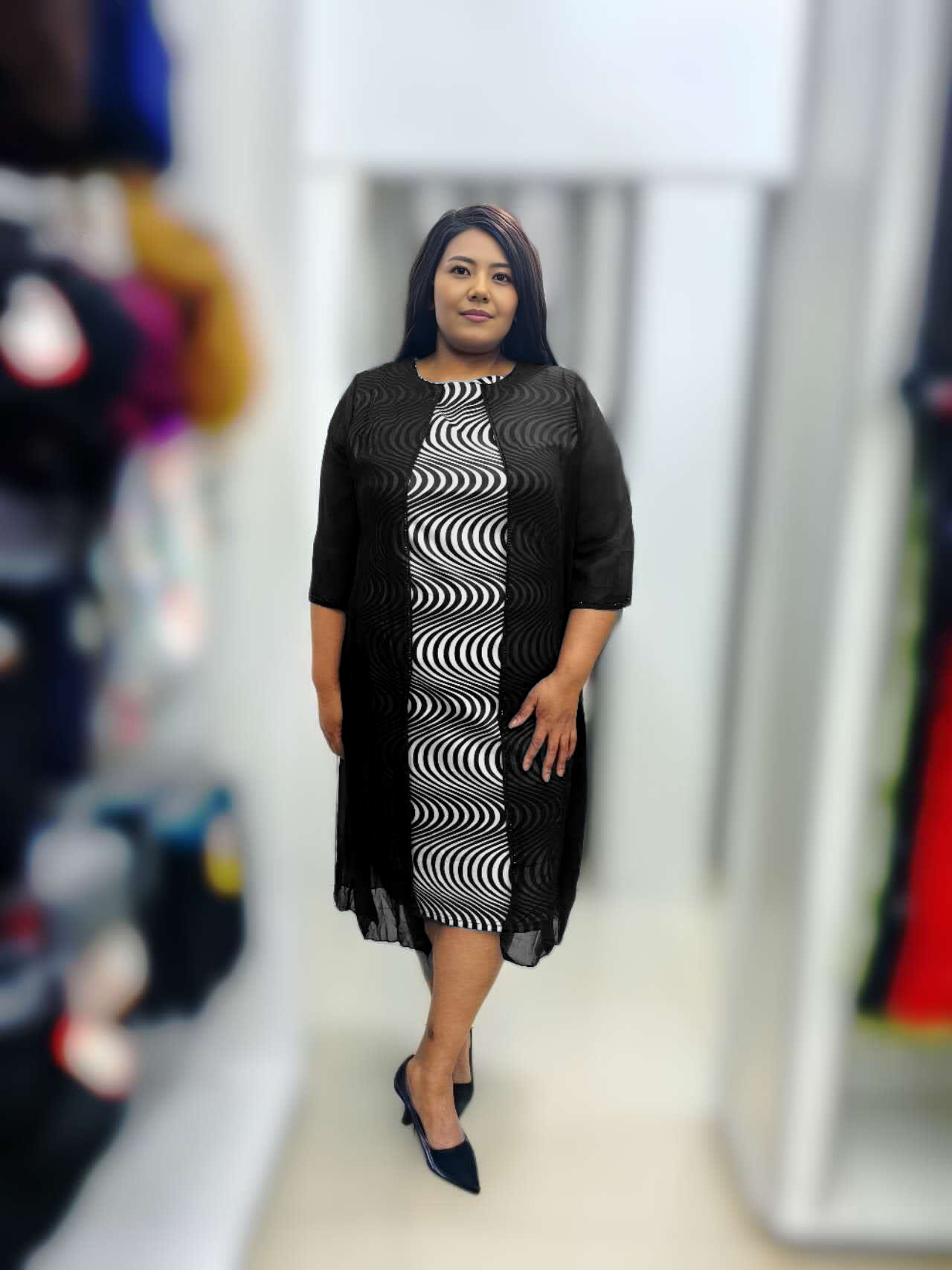 Plus size swirl midi dress with 3/4 sleeves, crew neck, black with white wave pattern