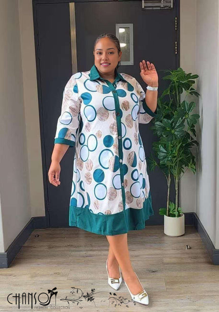 Plus size shirt dress, geometric circles print with blue and teal accents, midi length
