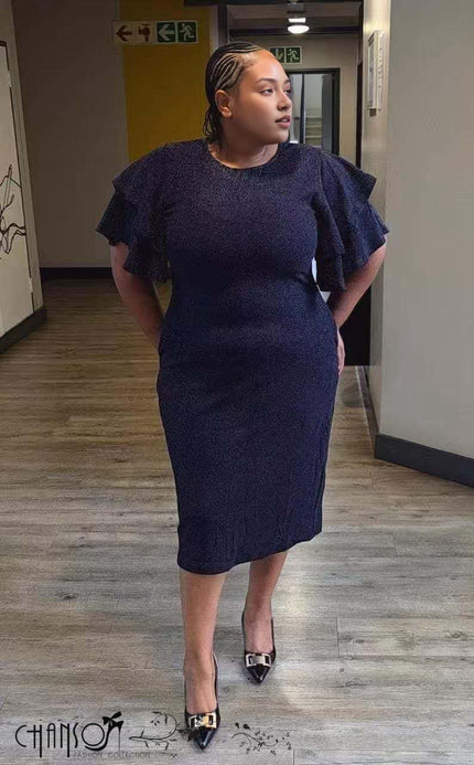 Plus size dark midi dress with ruffle sleeves, crew neck, side view