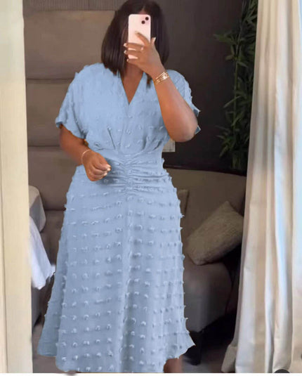 Sky-blue textured dot midi dress with cinched waist, V-neck, short sleeves