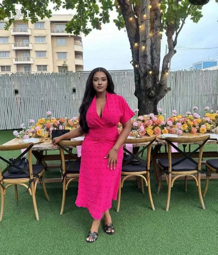 Deep-pink textured dot midi dress with cinched waist, V-neck, short sleeves