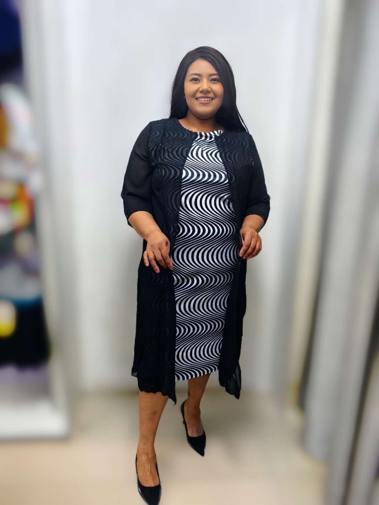 Swirl midi dress, black with white wave pattern, crew neck, 3/4 sleeves and side slit