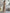 Button-Front Ribbed Knit Midi Dress with Long Sleeves and Pleated Hem Design
