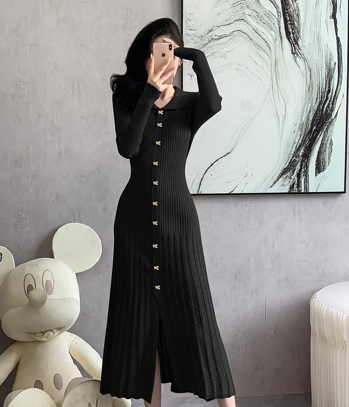 Black ribbed knit midi dress with button front, point collar, long sleeves, fitted hem.