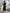 Button-Front Ribbed Knit Midi Dress with Long Sleeves and Pleated Hem Design