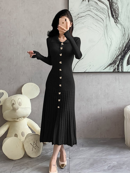Black ribbed knit midi dress with button front, point collar, long sleeves, side slit.