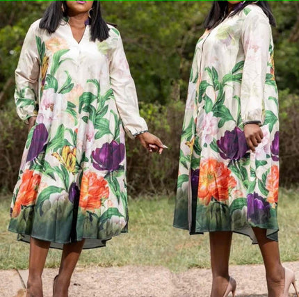 Floral V-neck midi dress, long sleeves, A-line skirt on white background