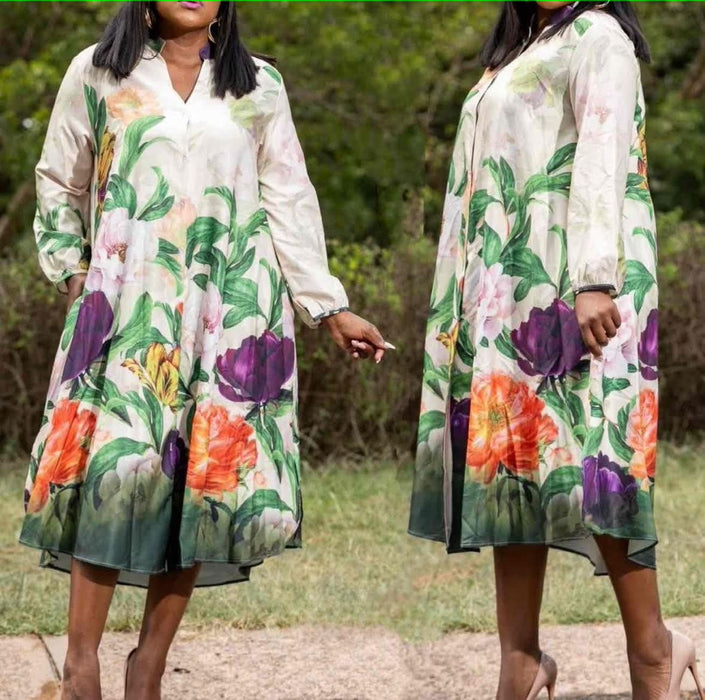 Floral V-neck midi dress, long sleeves, A-line skirt on white background