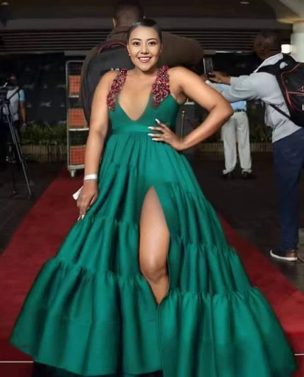 Dark green deep V maxi dress with sleeveless bodice and high front slit tiered skirt