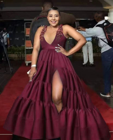 Maroon deep V maxi dress with sleeveless bodice and high front slit tiered skirt