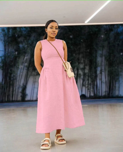 Pink sleeveless maxi dress with pleated waist and gathered A-line skirt