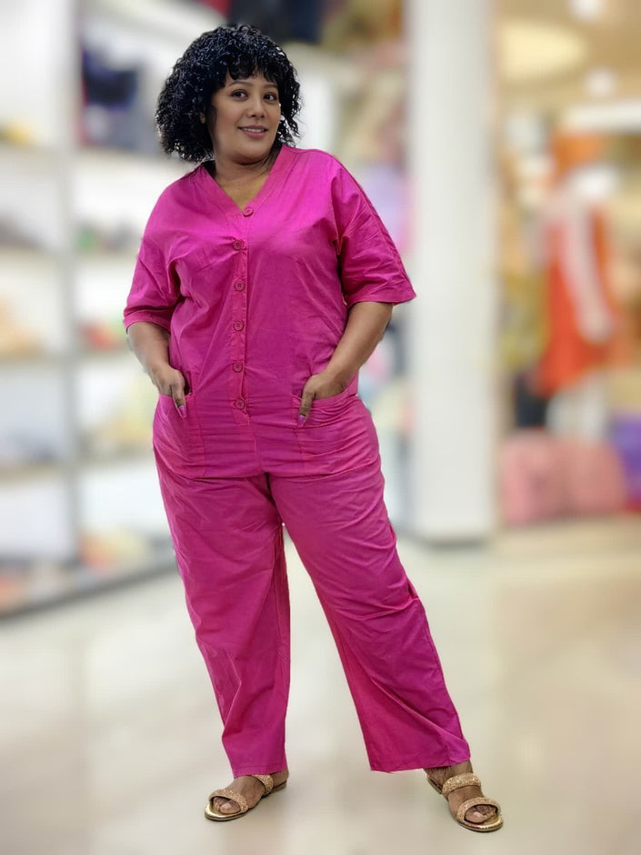 Deep-pink V-neck button-front loose-fit jumpsuit with short sleeves and patch pockets