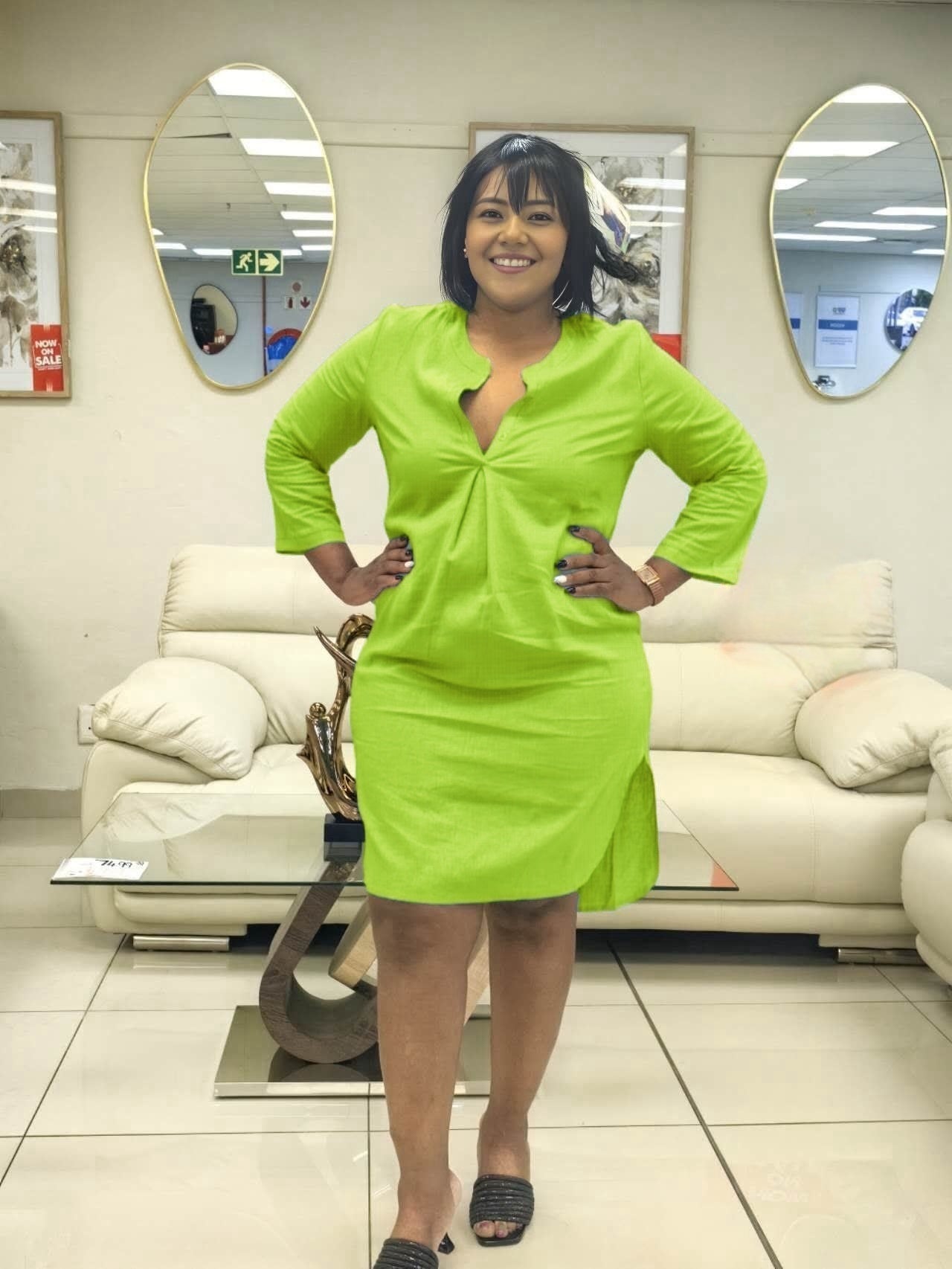 Lime green shirt dress with V-neck front and three-quarter sleeves, knee length.