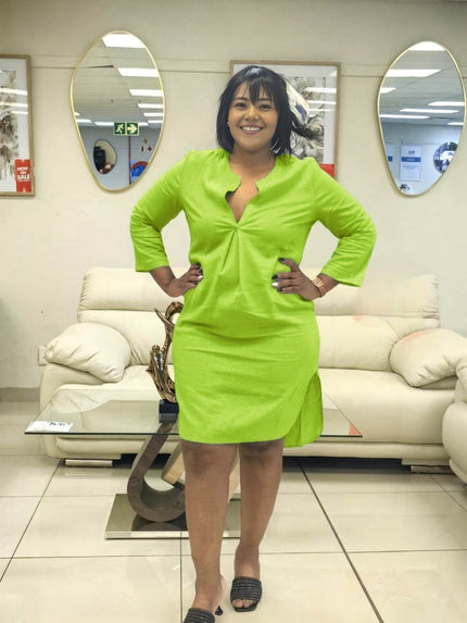 Lime green shirt dress with V-neck front and three-quarter sleeves, knee length.