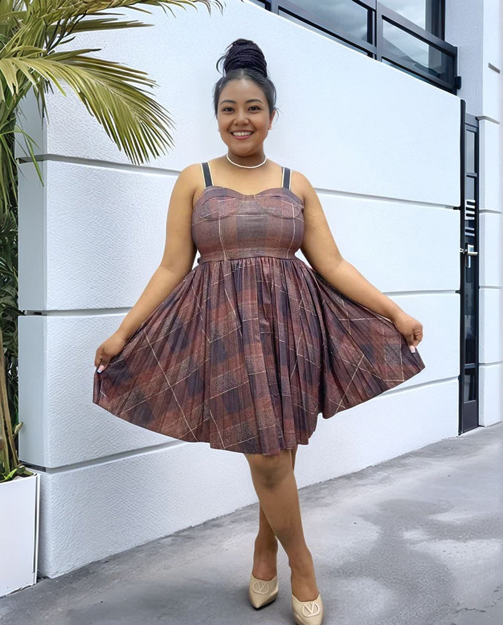 Burgundy plaid pleated mini dress with wide straps, square neckline, and flared skirt