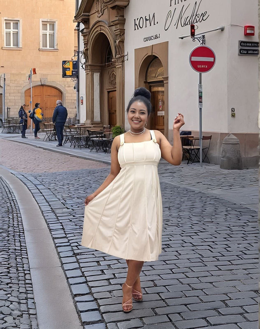 Cream pleated midi dress, sleeveless with square neckline and fitted waist