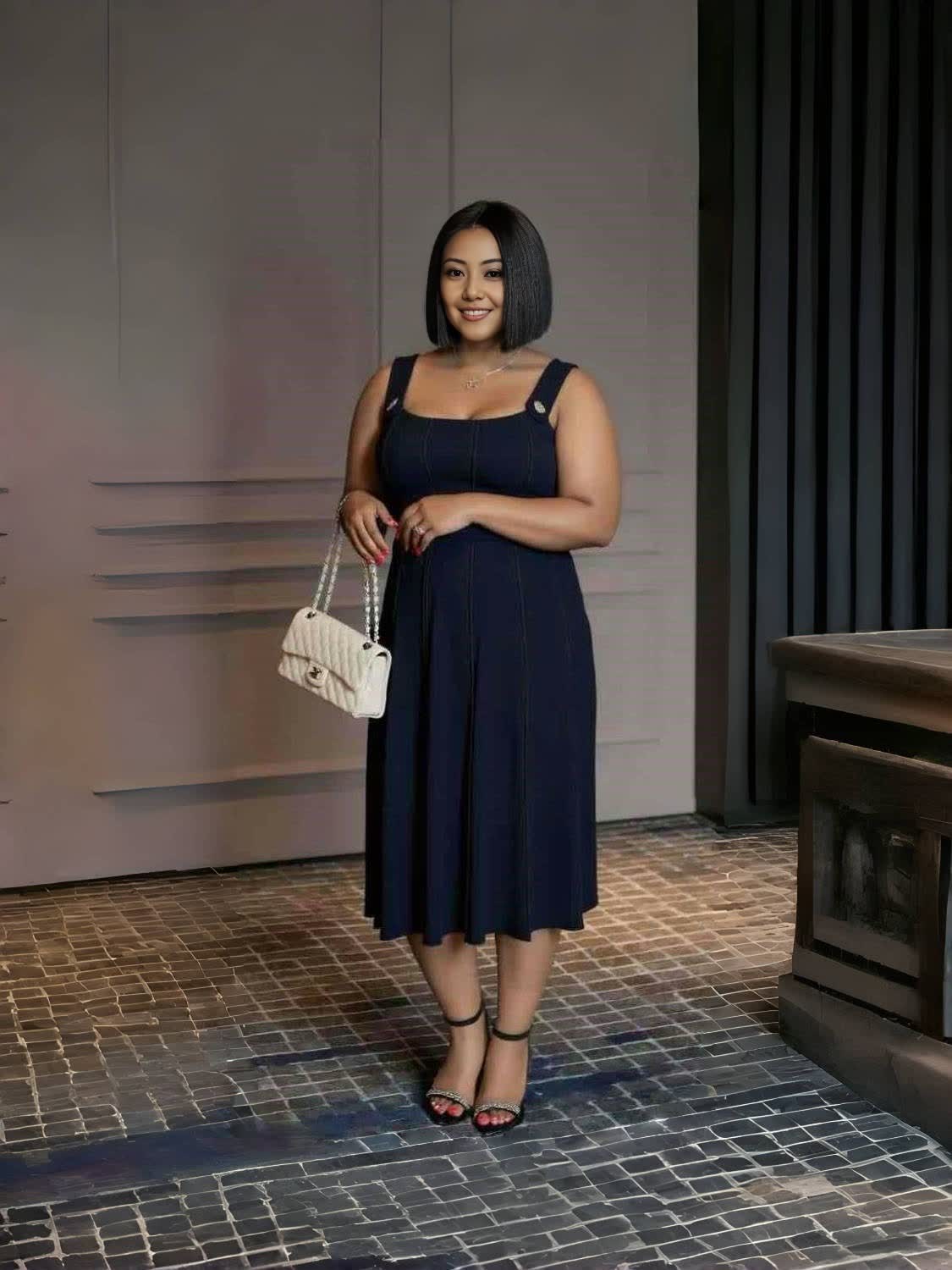Dark navy pleated midi dress, sleeveless with square neckline and adjustable straps