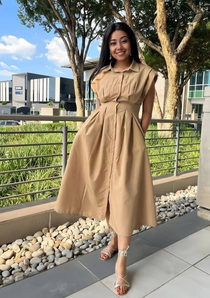 Nude pleated midi dress with belt, sleeveless collared bodice and full skirt