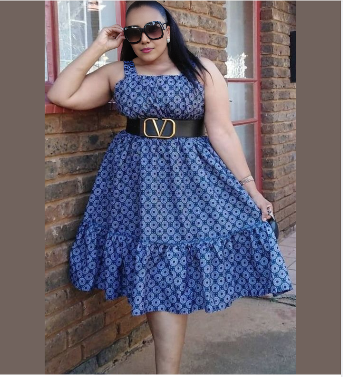 Blue printed A-line circle dress with sleeveless square neck and ruffled hem