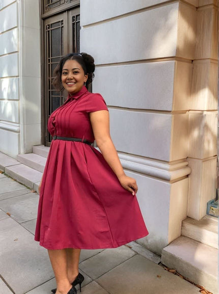 Deep maroon belted midi dress with collared button front and pleated skirt