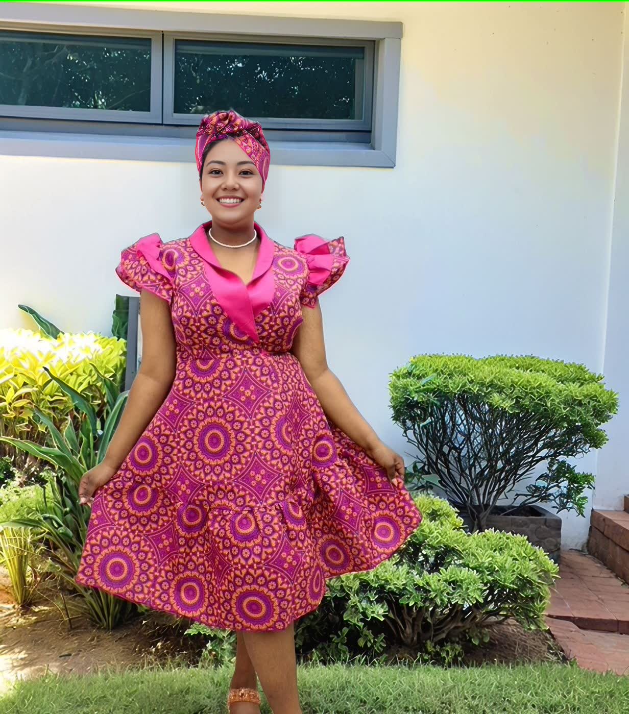 African Print midi dress with puff sleeves, pink purple pattern, V-neck ruffle