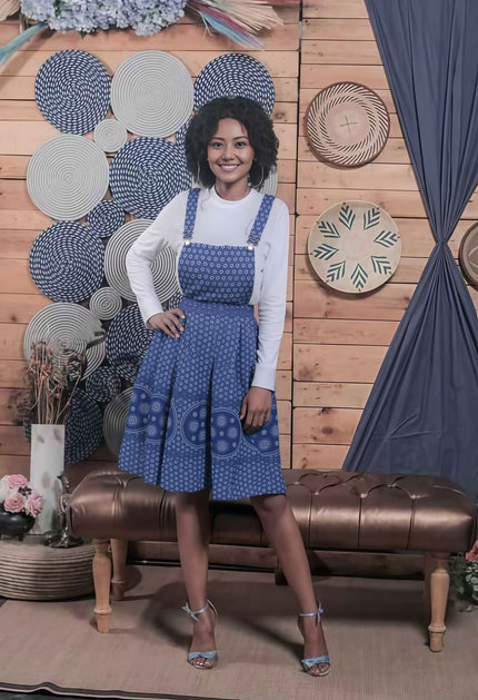 Blue plaid midi dress with adjustable straps and paneled skirt