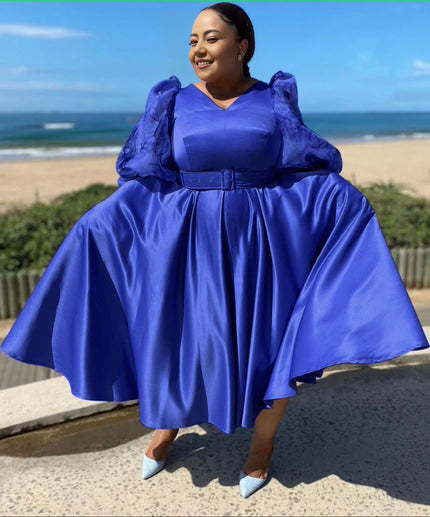 Blue satin midi dress with puff sleeves and waist belt, gathered full skirt