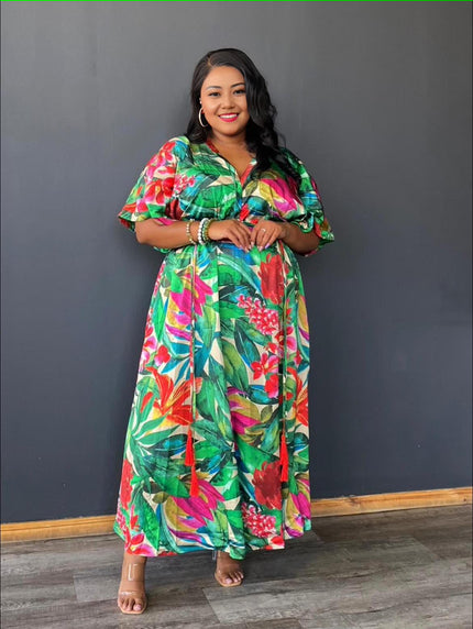 Floral maxi dress with V-neck and puff sleeves, green with red, pink, and yellow prints