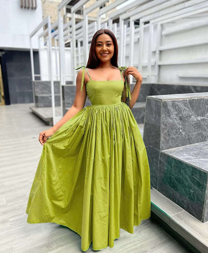 Lime-green sleeveless maxi dress with square neckline and pleated full skirt