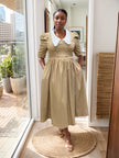 Vintage midi dress with puff sleeves, white contrast collar, tan gathered skirt and button bodice