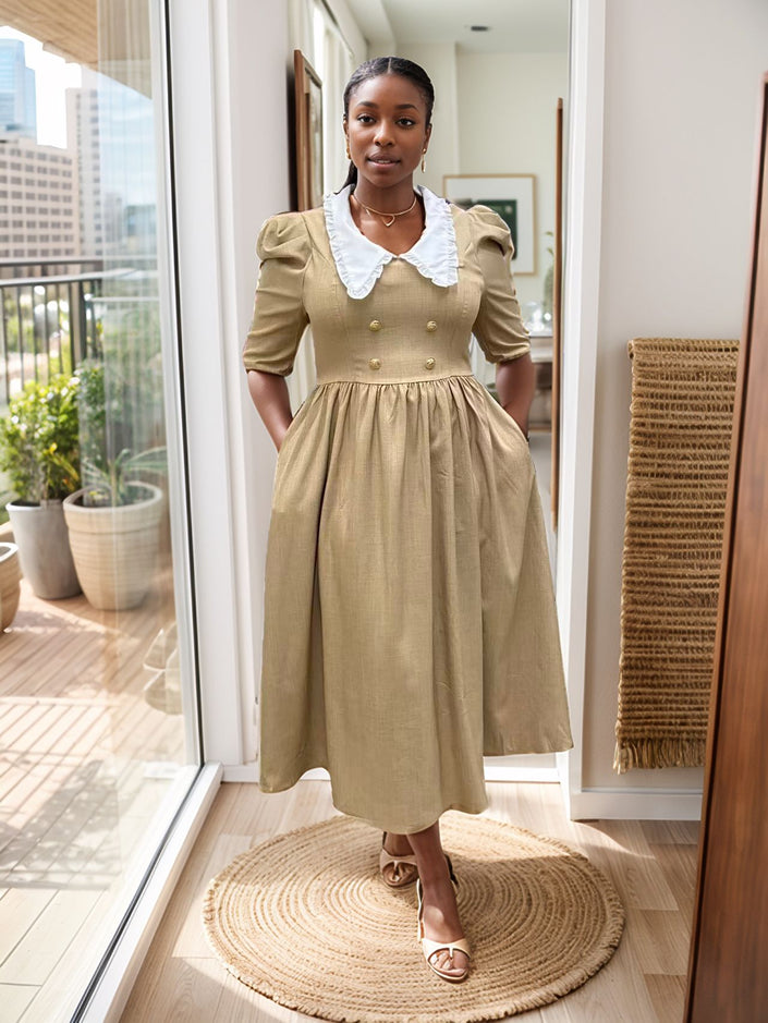 Vintage midi dress with puff sleeves, white contrast collar, tan gathered skirt and button bodice