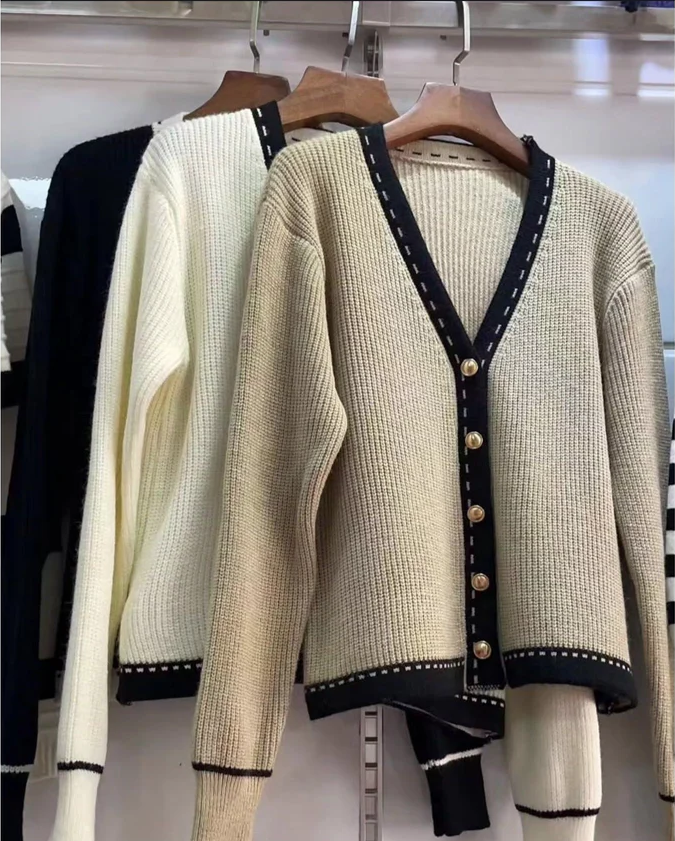 Khaki knit V-neck cardigan with black trim and button front, long sleeves