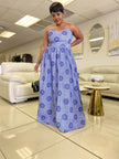 Strapless blue maxi dress with circular pattern, gathered waist and full skirt
