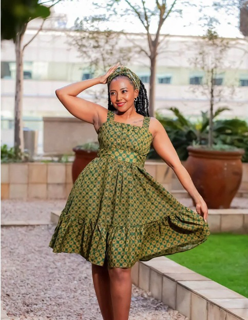 Green printed A-line circle dress with sleeveless square neck and ruffled skirt