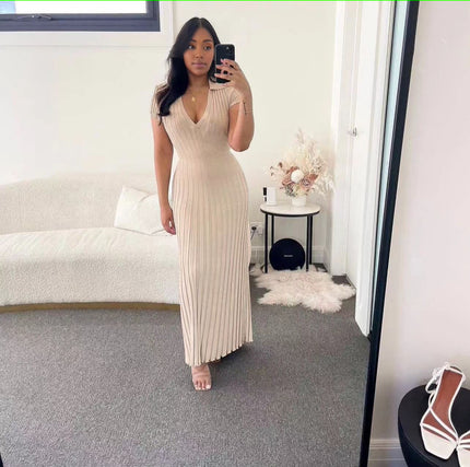 Beige ribbed knit maxi dress with V-neck and short sleeves, fitted column style