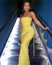 Yellow strapless jumpsuit with ruched bodice and side-tie wide-leg