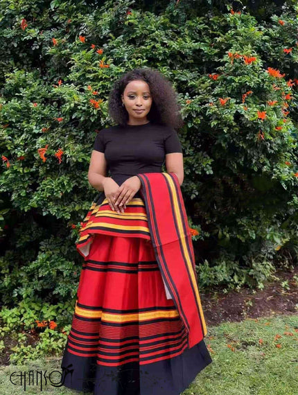 African maxi skirt set with black fitted top and red striped flared maxi skirt