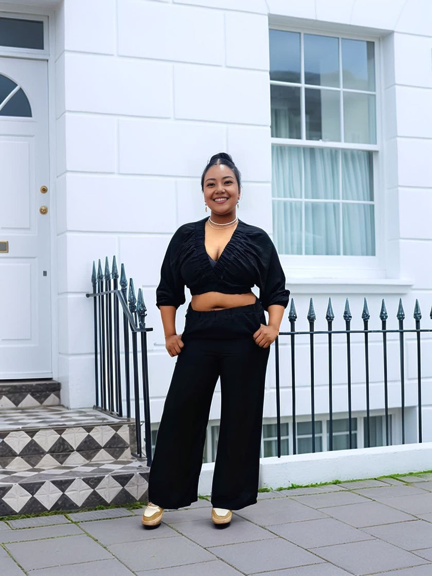 Black V-neck cropped top with wide-leg pant twin set, relaxed fit and draped waist
