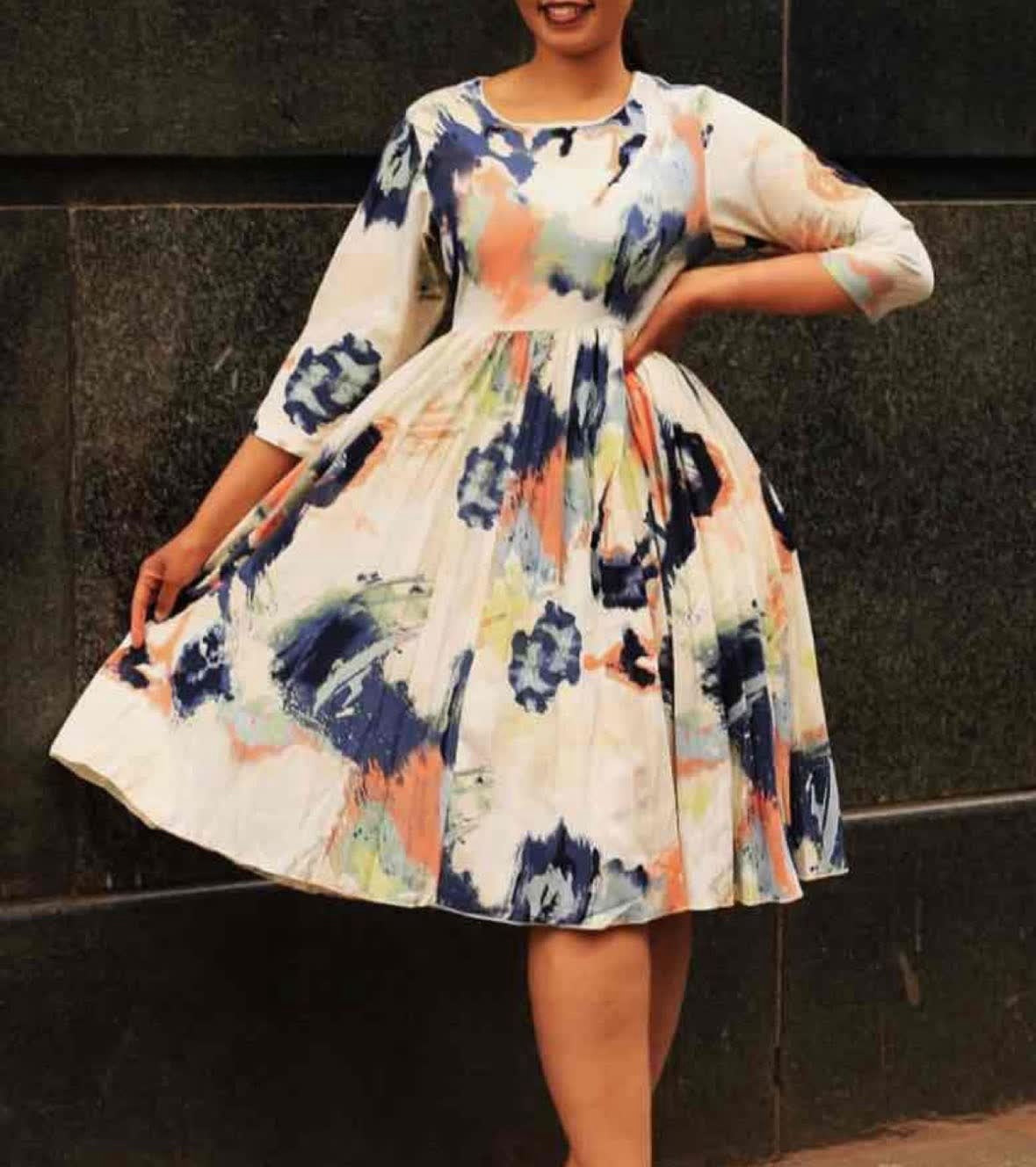Abstract floral flare dress with 3/4 sleeves, multicolor print on light background