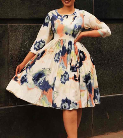 Abstract floral flare dress with 3/4 sleeves, multicolor print on light background