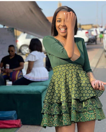 Green African print flared mini dress, long sleeves, tiered ruffle skirt