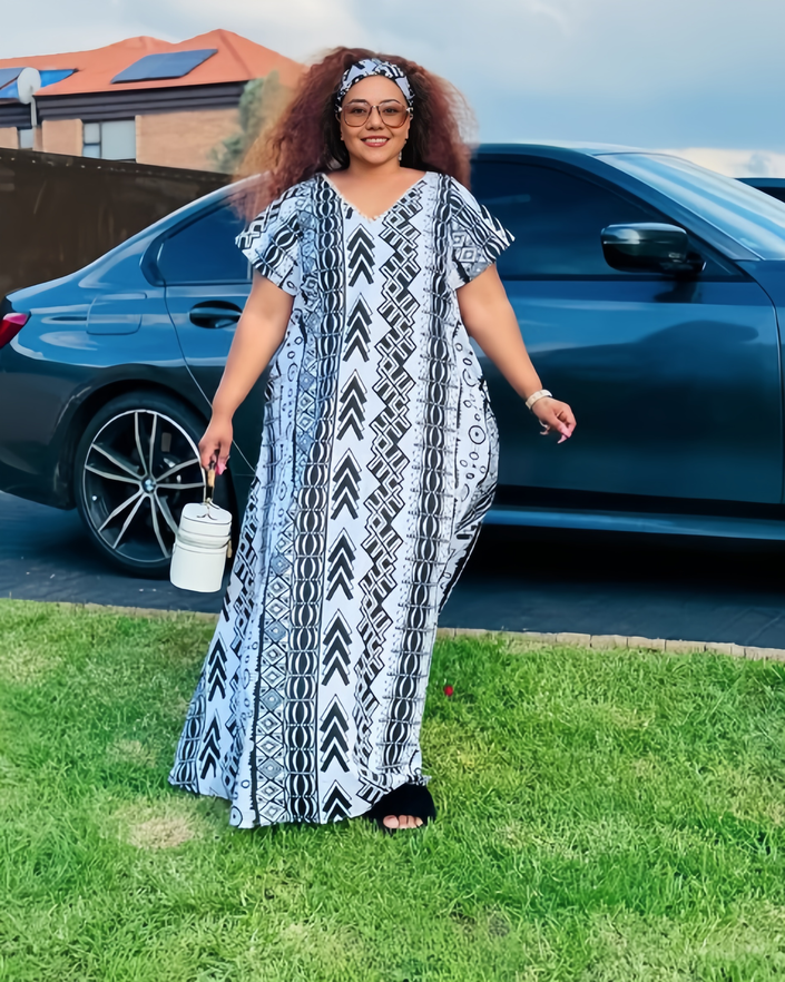 Plus size V-neck maxi dress, dark geometric print on white, short sleeves