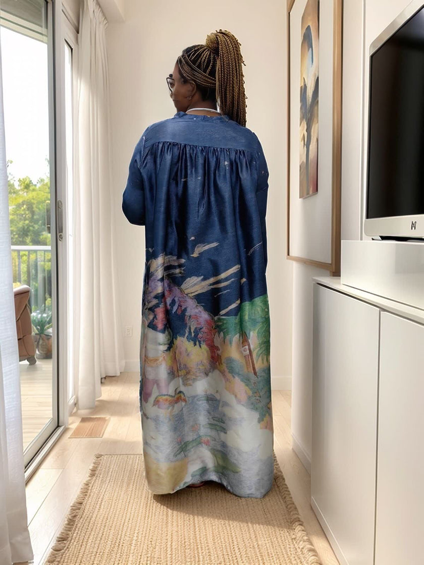 Loose-fitting printed dress with tropical landscape pattern and unique neckline design
