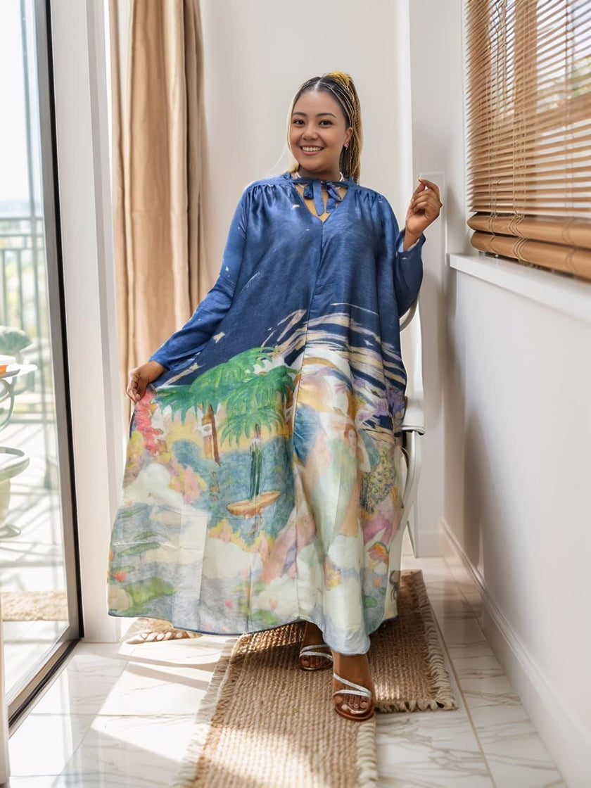 Blue loose fit maxi dress with tropical print and V-neck, long sleeves
