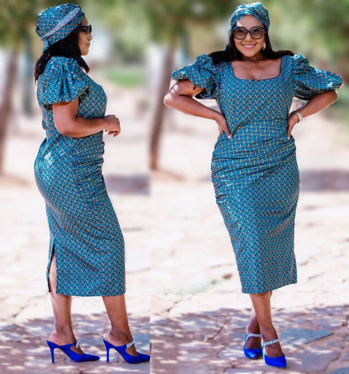 Teal geometric print midi dress with puff sleeves, square neckline, and side slit