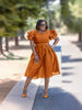 Vintage Style Puff Sleeve Dress with Cinched Waist and Elegant Midi Skirt