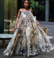 Maxi dress sleeveless tropical leaf print, spaghetti straps, flowing skirt