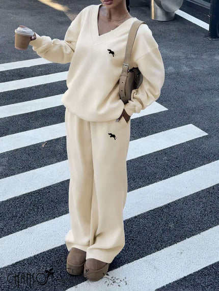 Cream V-neck top and wide-leg pants set with small dog embroidery