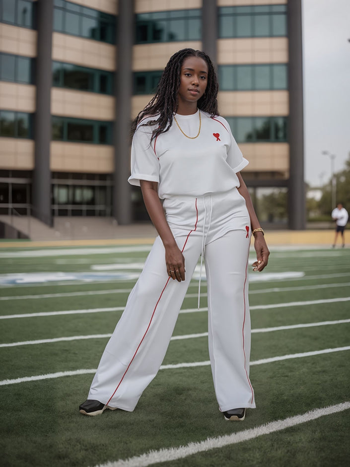 White wide-leg pants with stretch waist and side piping accents
